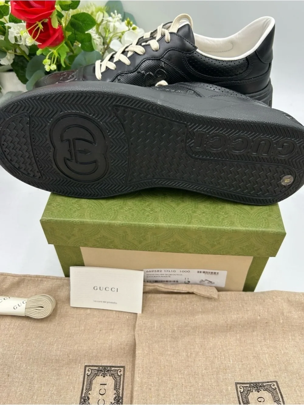 Gucci, GG embossed, black leather sneakers size 11 fits 11.5 made in Italy